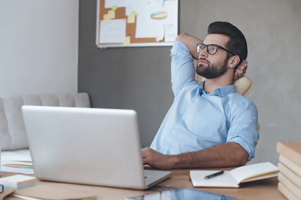 Handsome working with laptop in office — Stock Photo, Image