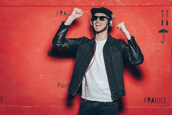 Trendy looking young man with headphones — Stock Photo, Image