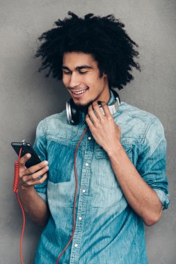 African man wearing headphones