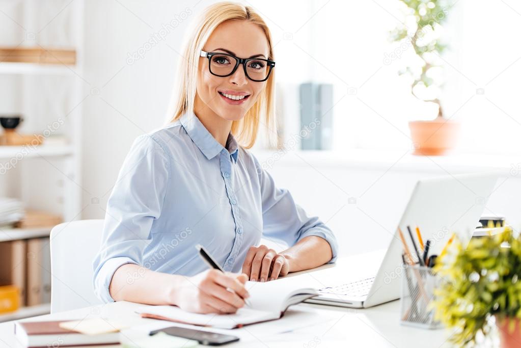 woman making some notes