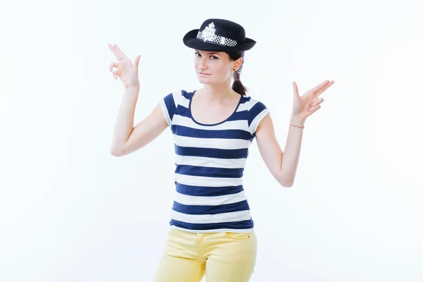 Playful woman holding hands as guns — Stock Photo, Image