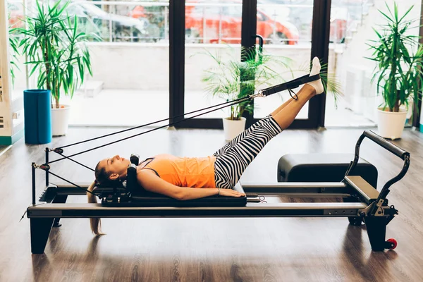 Work out in a pilates room — Stock Photo, Image