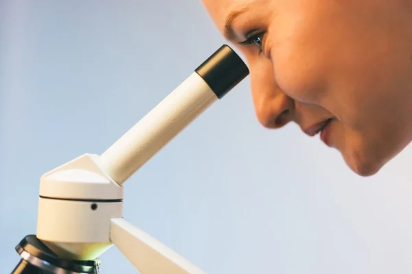 Scientist with microscope — Stock Photo, Image