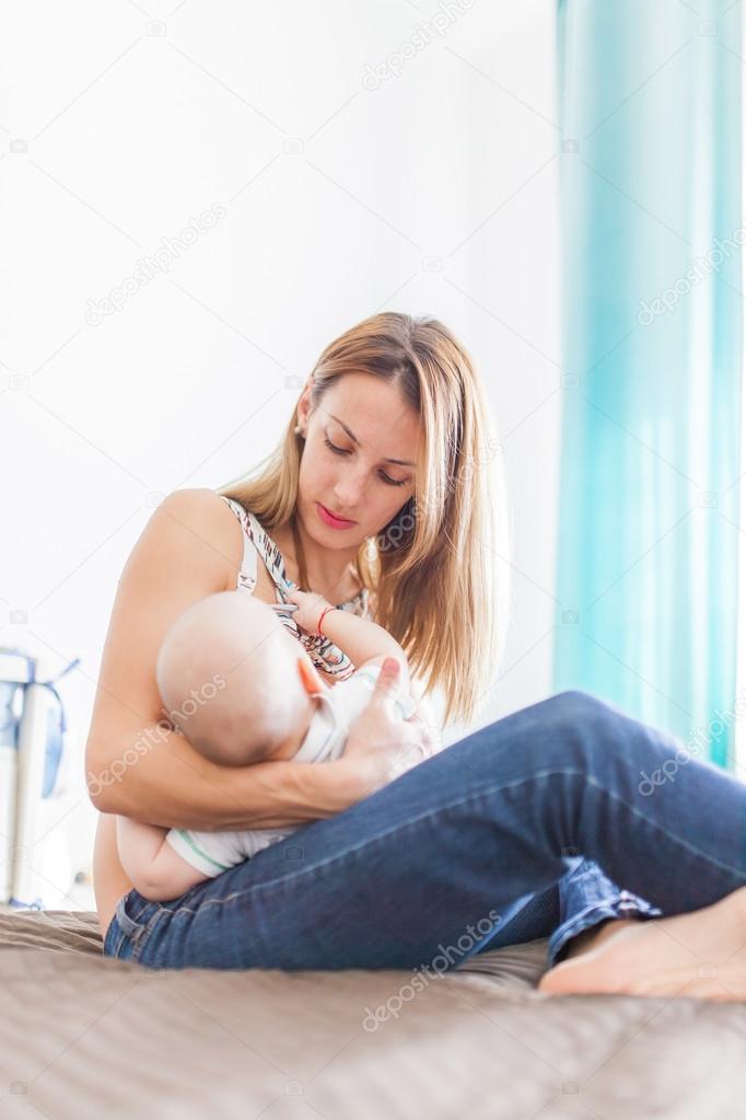 Mother breastfeeding her baby