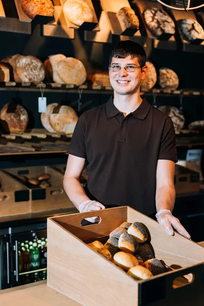Säljande bröd pose — Stockfoto
