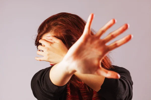 Woman protecting herself — Stock Photo, Image