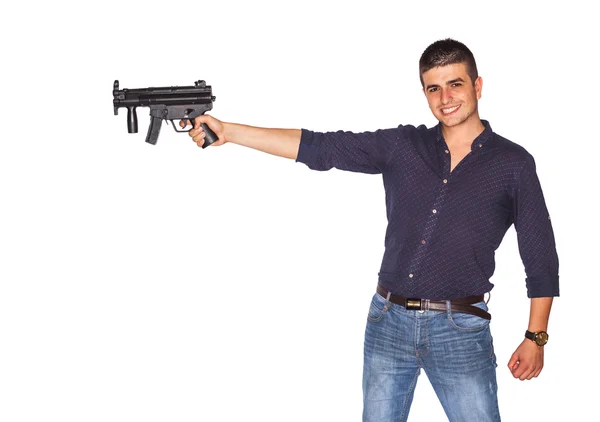 Young man pointing gun — Stock Photo, Image