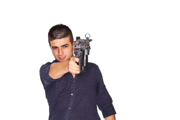 Genç adam holding silahı — Stok fotoğraf