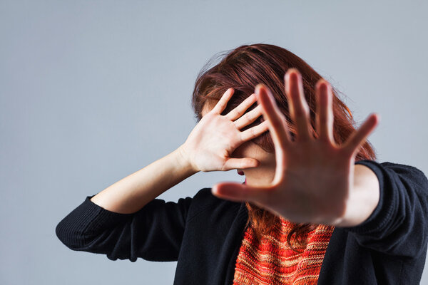 Woman protecting herself