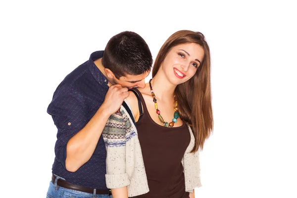 Boy kissing girlfriend's shoulder — Stock Photo, Image