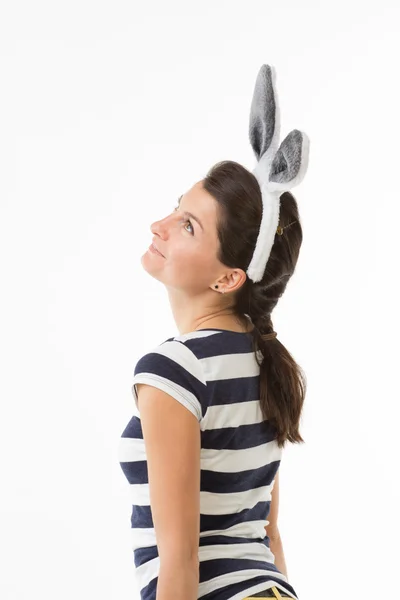 Dreamy woman with rabbit ears — Stock Photo, Image