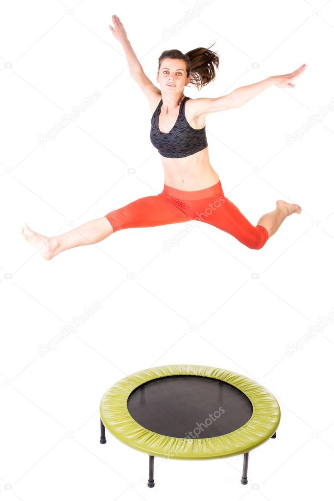 Jumping on fitness trampoline 