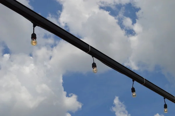 Bulb Lights Against Blue Sky — Stock Photo, Image