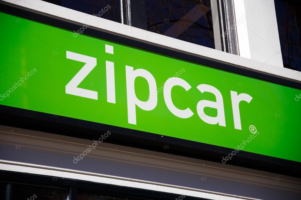 PORTLAND, OR - FEBRUARY 2, 2016: Zipcar sign in downtown PDX, a ride sharing company with electric and hybrid automobiles.