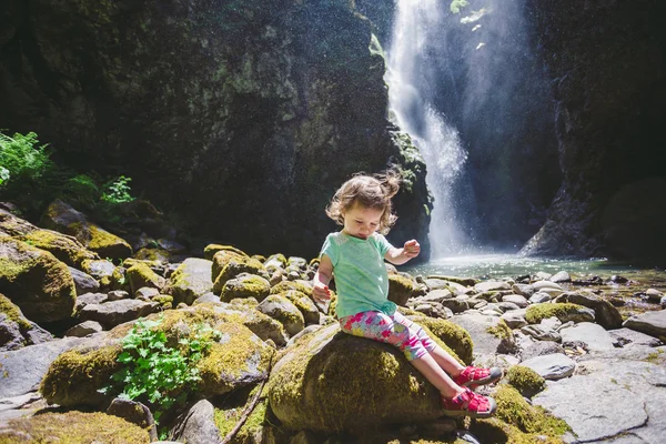 Portrait of a Young Child by Waterfall — Stock Photo, Image