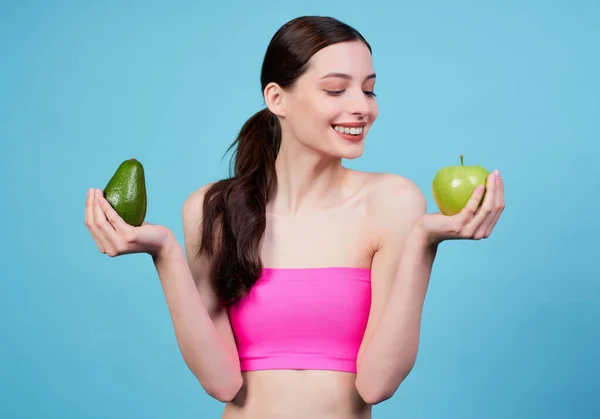 Cute Beautiful Young Girl Sports Pink Top Holding Avocado Green — Stock Photo, Image