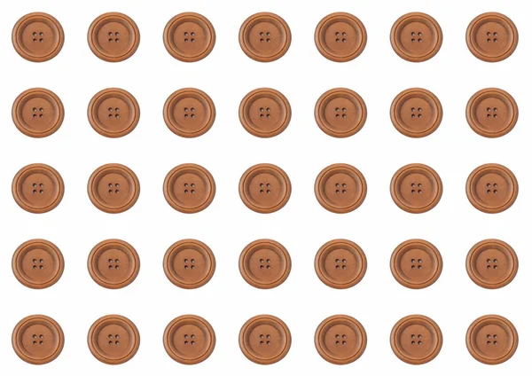 Beyaz arkaplanda pürüzsüz düğme dokusu.