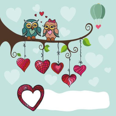 Baykuş çift şube üzerinde oturan 