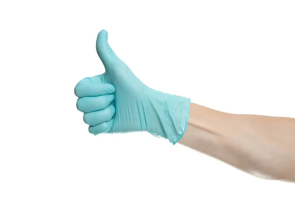 Ręka Niebieskiej Rękawicy Odizolowana Biało Kciukiem Góry — Zdjęcie stockowe