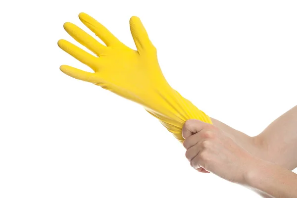 交上黄色乳胶手套 用于清洗白色背衬上的孤立物 — 图库照片