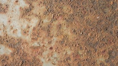 Paslı, eski, pürüzlü, metal bir doku. İç dekorasyon ve endüstriyel yapı tasarımı için koyu paslı metal desen arka planı. Vintage effec