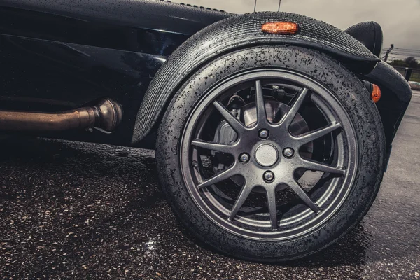 Sport car wheel on race track — Stock Photo, Image