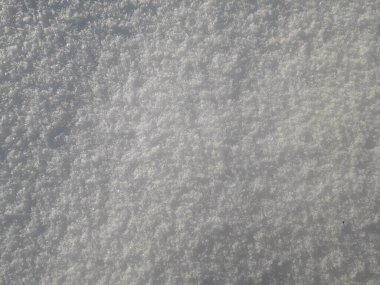 Kar zemini. Yeni düşmüş beyaz kar zemine yakın plan..