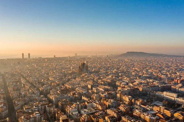 Aerial drone shot of Barcelona city before sunrise golden hour —  Fotos de Stock