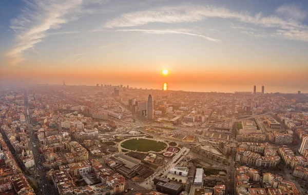 Aerial drone shot of agbar tower by Barcelona beach with sunrise — Stock Photo, Image