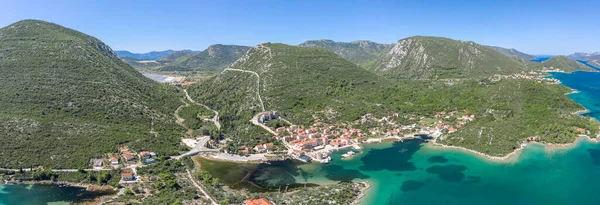 Aerial panorama drone shot of Mali Ston with City Wall of Ston in Ragusa near Dubrovnik in Croatia summer