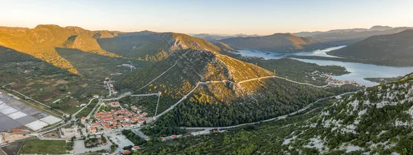 Aerial panorama drone shot of Ston city wall in Ragusa region near Dubrovnik in Croatia summer sunrise