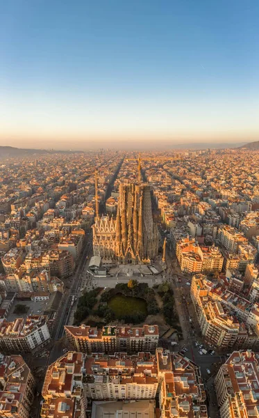 Aerial drone shot of Barcelona city center in Sunrise golden hour during Spain winter Imágenes de stock libres de derechos