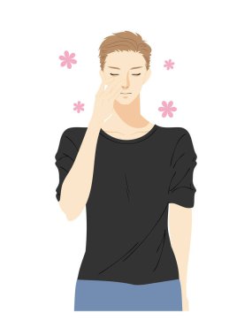 Cilt bakımı yapan genç bir adamın üst vücudu.