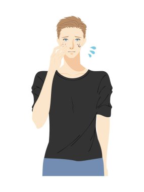 Cilt bakımı yapan genç bir adamın üst vücudu.