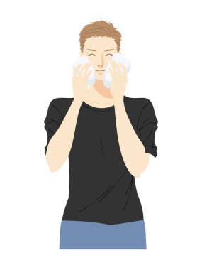 Cilt bakımı yapan genç bir adamın üst vücudu.