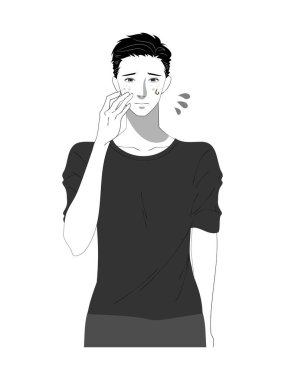 Cilt bakımı yapan genç bir adamın resmi