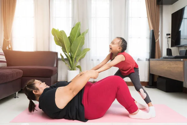 Fat Woman Asian Little Girl Exercising Home Sport Recreation Idea — Stockfoto