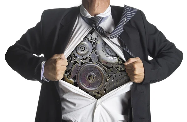 Hombre de negocios mostrando un traje de superhéroe debajo de la maquinaria metal engranajes idea concepto —  Fotos de Stock