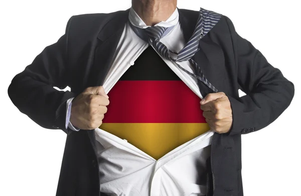 德国国旗和展示里面的超级英雄穿的商人 — 图库照片