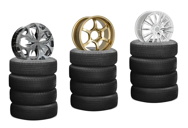 Car alloy wheels on pile tires — Stock Photo, Image