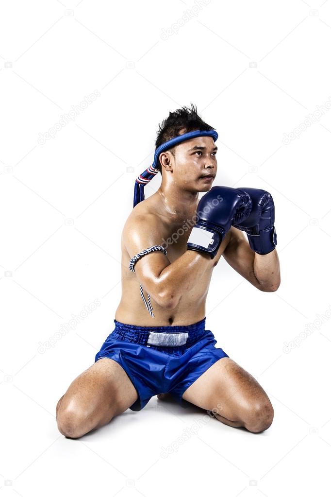 Thai boxer with thai boxing action