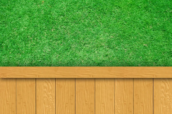 Placas de madeira com grama verde — Fotografia de Stock