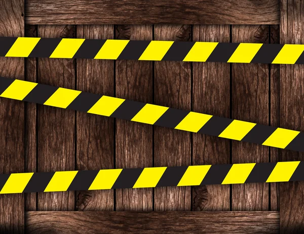 Placas de madeira com fita de restrição — Fotografia de Stock