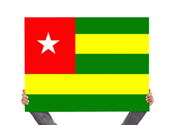 Styrelsen med Togo flagga — Stockfoto