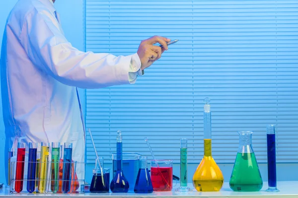 Scientist hand with pen — Stock Photo, Image