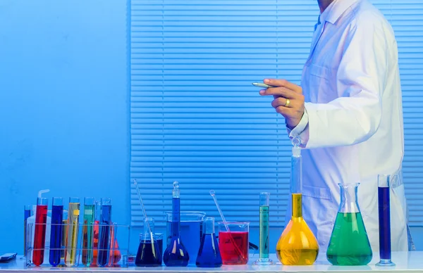 Scientist hand with pen — Stock Photo, Image