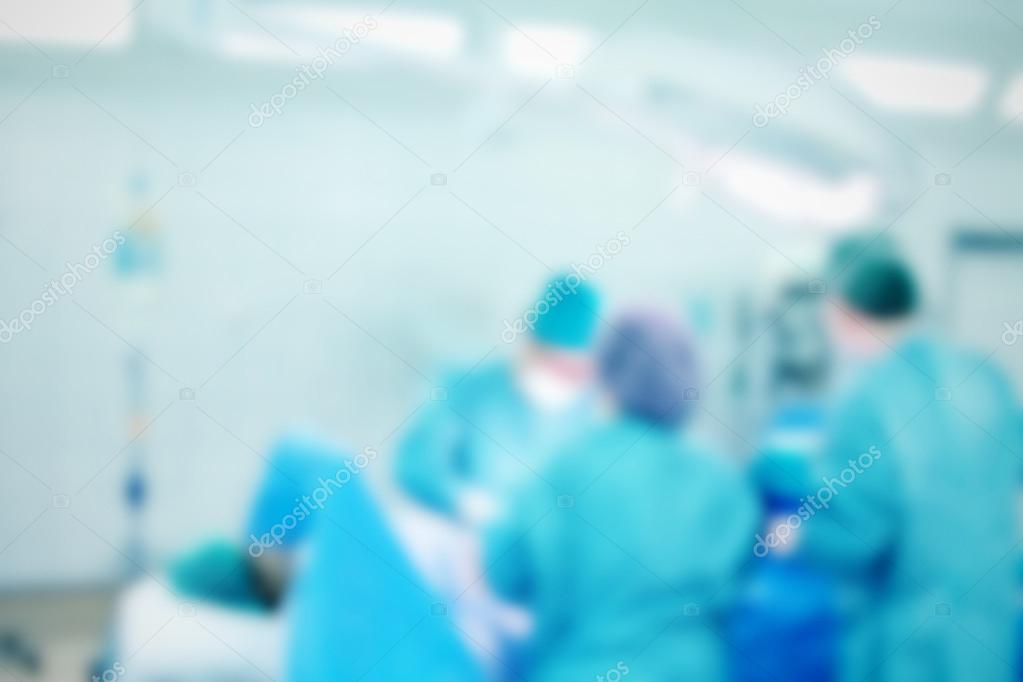 Blurred background with team surgeon at work in operating room3