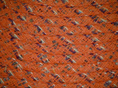 Karışık tasarım desenli turuncu renk kumaş dokusu.