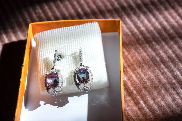 silver jewelry earrings in a gift box