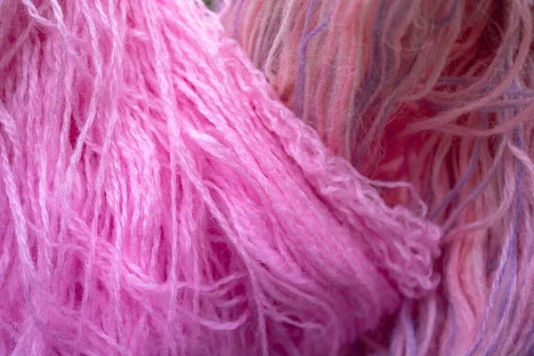closeup pink threads background texture